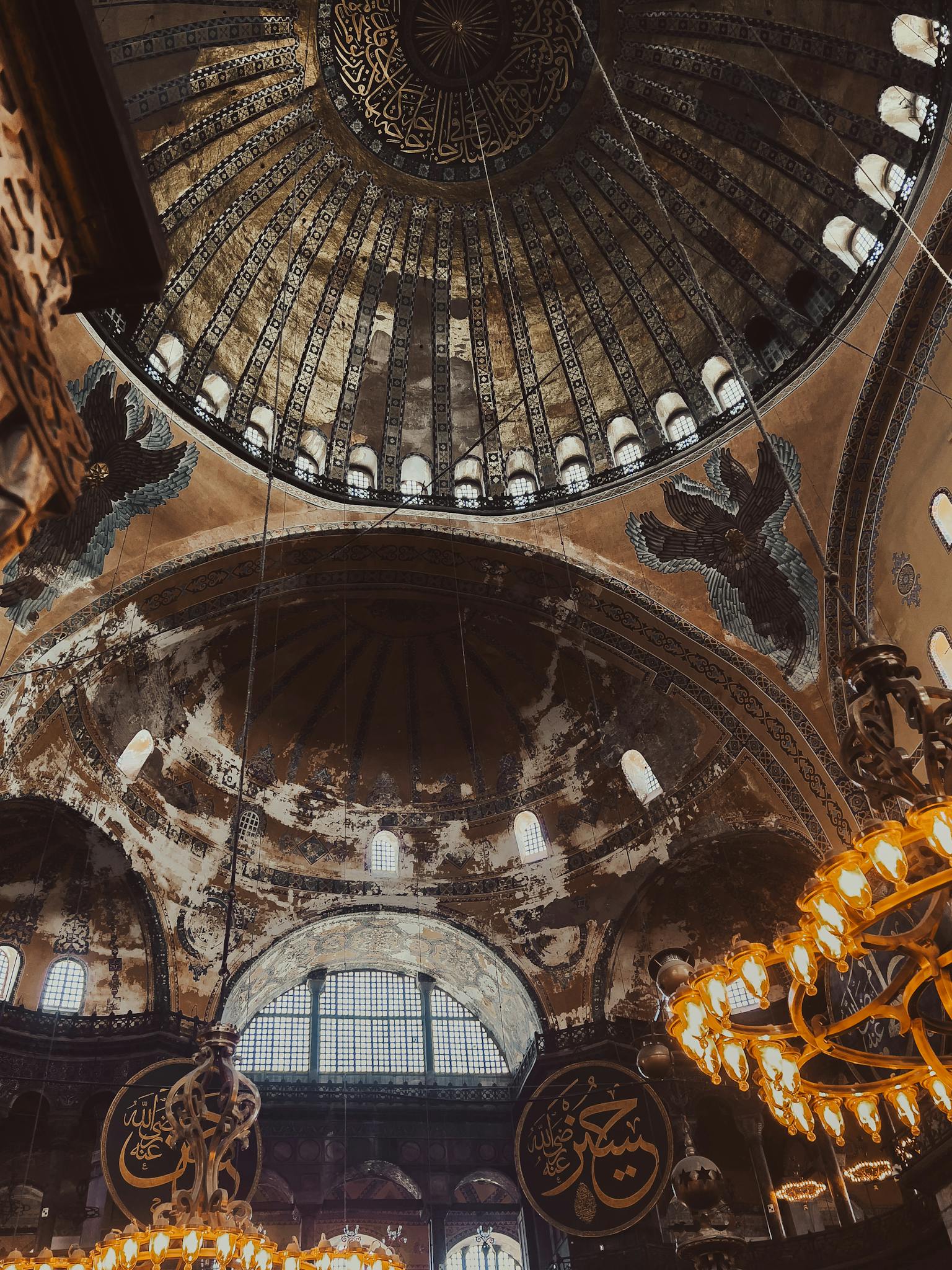 Explore the ornate dome and stunning interior design of Istanbul's iconic Hagia Sophia mosque.